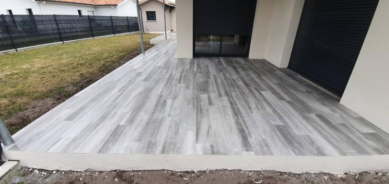 Pose de carrelage gris clair à Sanguinet